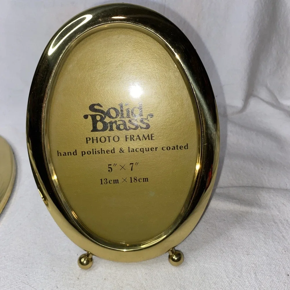 2 Solid Brass Oval Pictures Frames. One 5x7